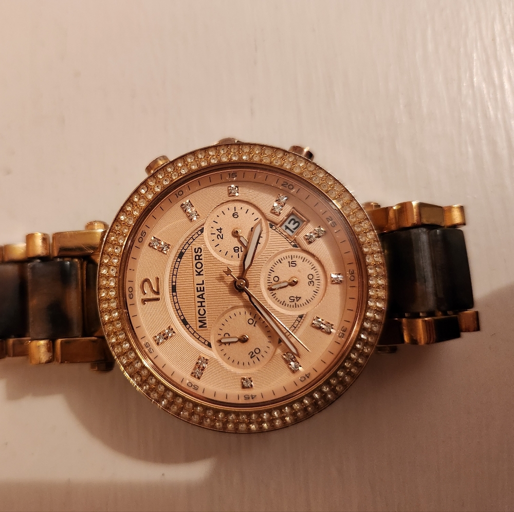 Rose gold tortoise Michael kors wrist watch